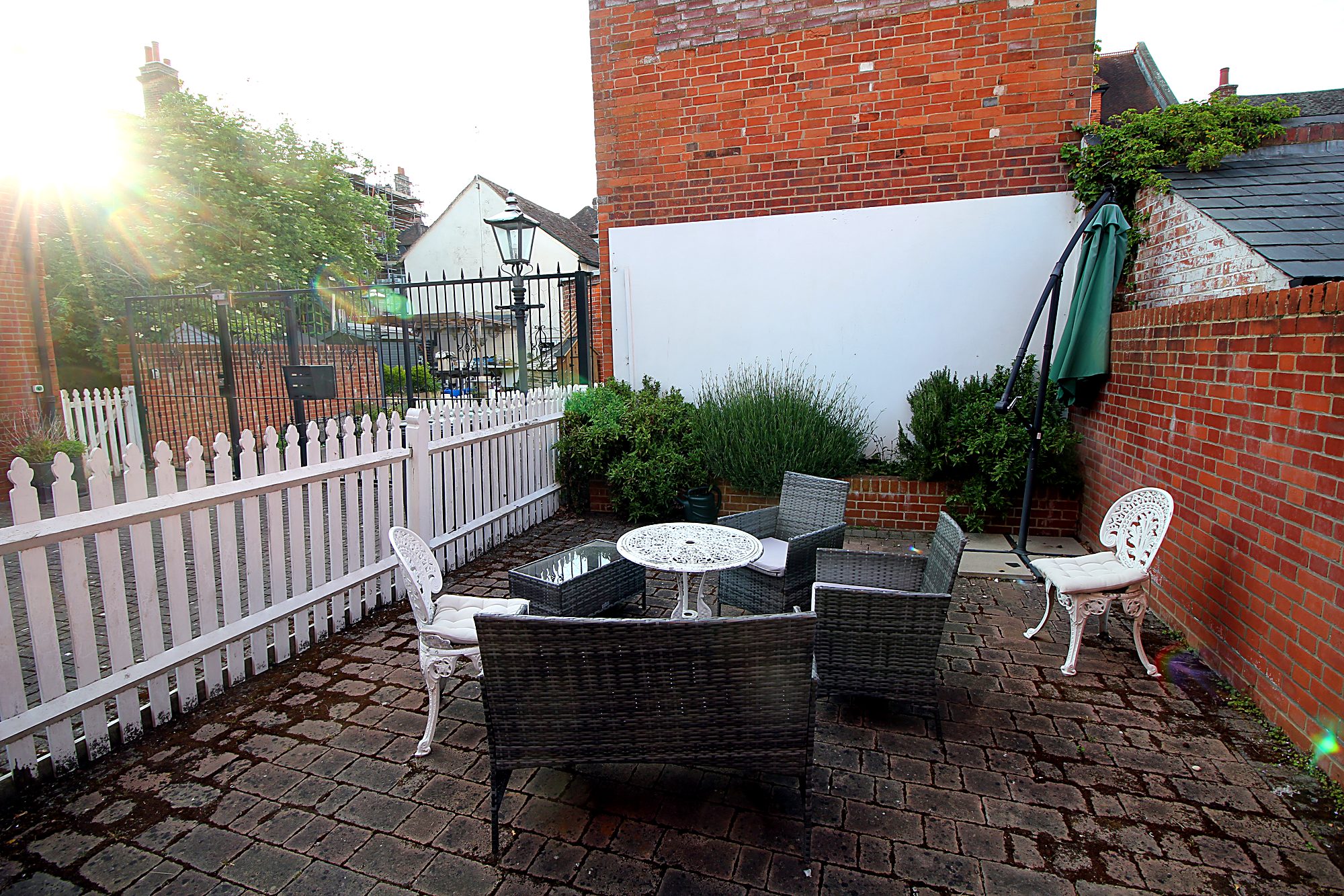 Private rear patio with seating